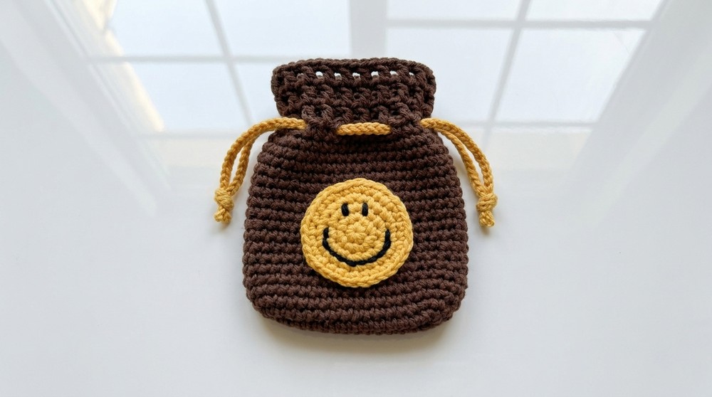 Cheerful Crochet Smile Pouch Pattern for Little Treasures