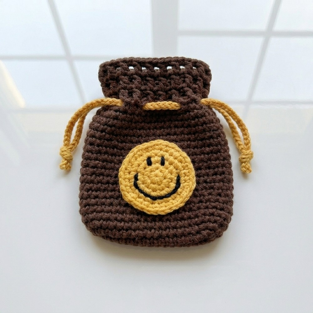 Cheerful Crochet Smile Pouch Pattern for Little Treasures